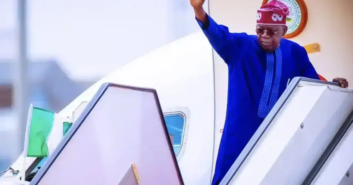 President Bola Tinubu waving goodbye