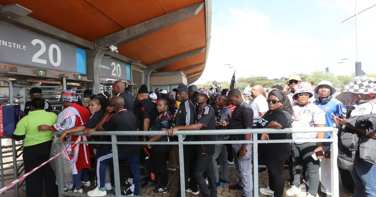 Soccer fans at FNB Stadium before the Soweto derby between Orlando Pirates and Kaizer Chiefs, Johannesburg. PHOTO ANTONIO MUCHAVE
