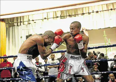 Aphiwe Mboyiya, right, seen here in action against Jasper Seroka, takes on Kutlwano Ogaketse in an IBO Africa junior-welterweight title clash in Botswana on Friday.