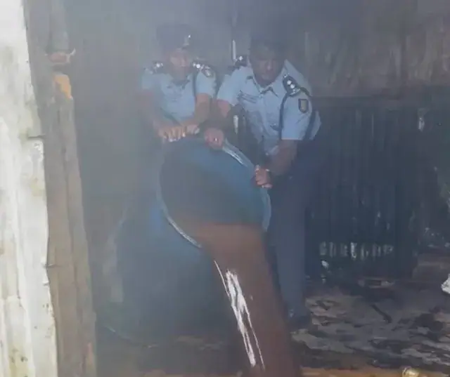 Kenyan Police Raid Chang'aa Den in Kasarani
