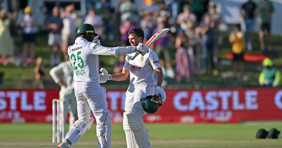 Wiaan Mulder is congratulated by Kagiso Rabada after scoring his century against Australia on Friday. Picture: BackpagePix