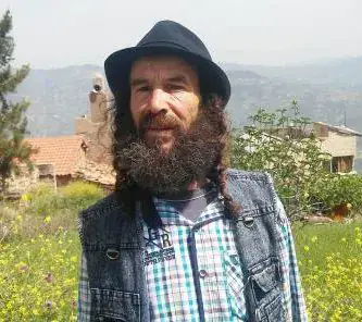 Renowned Algerian Poet Ahmed Lahlou Passes Away at 54