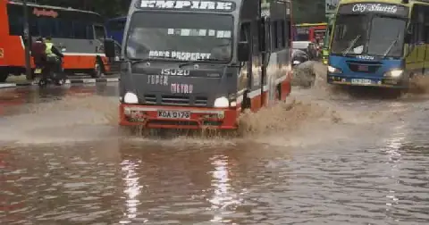 A file image of motorists driving in the rain