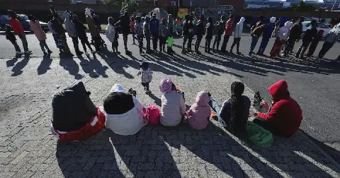 Zimbabwean migrants queue outside the Cape Town home affairs offices on June 30 2026, the day of an unofficial deadline set by anti-immigrant groups for all undocumented migrants to leave SA. Picture:
