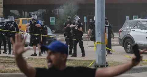 Protesters gathered at the site where a man was shot in his vehicle by an ICE officer in Austin, Texas, on September 20 2026. Picture: