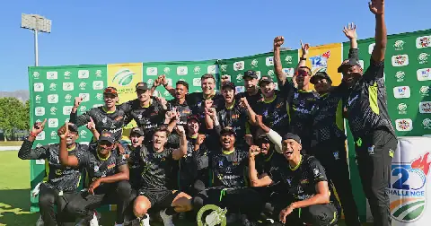 Warriors players celebrate with the T20 Challenge trophy after winning last season's final against Boland.