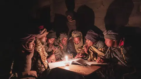 Shepherds attend a part-time night school near Mokhotlong, Lesotho. For many, these classes are the only form of education they can access.
