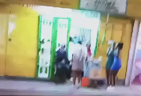 Kenyan Men Surprised by Street Vendors in Mombasa