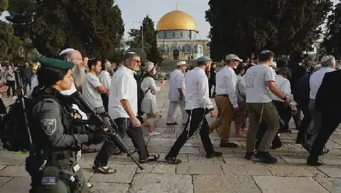 Dozens of Settlers Storm Hebron Shrine with Israeli Minister