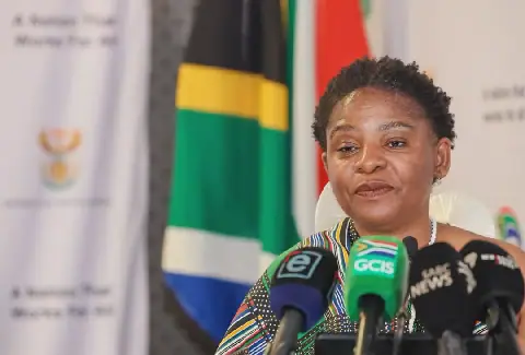 Khumbudzo Ntshavheni, minister in die presidensie, Dinsdag op die mediakonferensie in Pretoria.