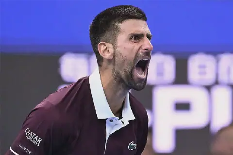 Tennis: Djokovic grinds out opening-round win at China Open