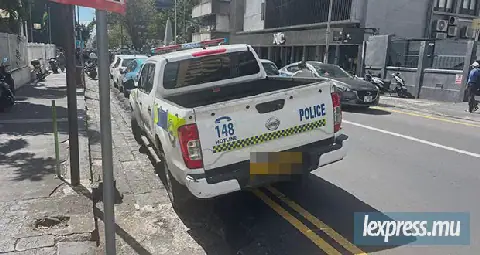 Police Cars Park on Yellow Lines, Sparking Controversy in Mauritius