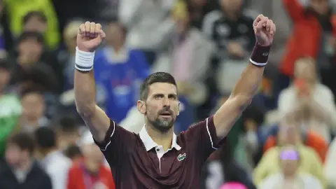 Djokovic grinds out opening-round win, Auger-Aliassime out