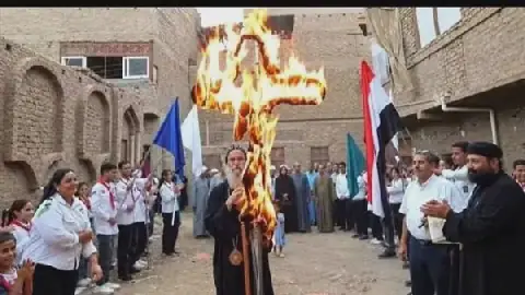 Egyptian Clergyman Sparks Debate with Image of Burning Cross