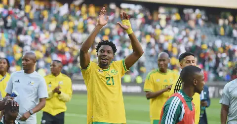 Ime Okon celebrates with supporters after Bafana Bafana's 2027 Africa Cup of Nations qualifying Group D win against Guinea at Orlando Stadium on September 26. Picture: Phakamisa Lensman/BackpagePix