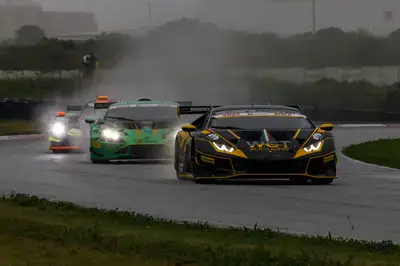 Michael Stephen ahead of Stuart White and Charl Visser in the rain at Aldo Scribante Raceway on Saturday