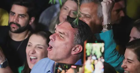 Brazilian presidential candidate Flavio Bolsonaro reacts after hearing he will face President Luiz Inácio Lula da Silva in a runoff of the presidential election later this month, in Brasilia, Brazil, on October 4 2026. Picture: Reuters/Adriano Machado