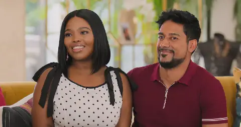Rosemary Zimu-mnguni as Mmabatho and Kyle Clark as Varshen in How To Ruin Diwali: Meet The Parents. Cr. Courtesy of Netflix © 2026