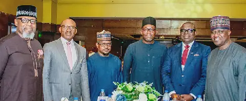 Ed Ubong, Director, Decade of Gas Secretariat (left); Momoh Oyarekhua, Chairman, Crude Oil Refinery-owners Association of Nigeria (CORAN) (second left); Umar Gwandu, Technical Assistant to the Minister of State for Petroleum (Oil) (third left); Rabiu Abdullahi Umar, Authority Chief Executive (ACE), Nigerian Midstream and Downstream Petroleum Regulatory Authority (NMDPRA) (third right); Adegbite Falade, Chairman, Independent Petroleum Producers Group (IPPG)/CEO Aradel Holdings Plc (second right), and Hassan Mahmud, Chief Economist, Dangote Group during a dinner in honour of NMDPRA ACE at the 3rd Edition of Nigeria Oil Refining Summit (NORS 2026) hosted by CORAN, in Lagos.