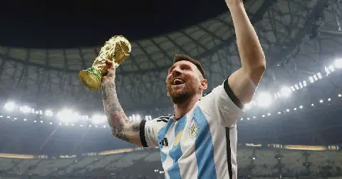Argentina's Lionel Messi celebrates with the trophy after winning the 2022 Fifa World Cup final against France at Lusail Stadium, Qatar on December 18 2022.