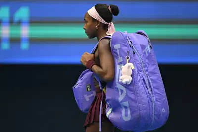 The US's Coco Gauff leaves the court after losing her women's singles match against Belgium's Elise Mertens at the China Open in Beijing on Wednesday