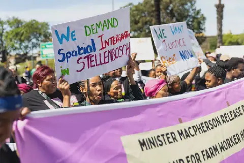 Farm workers march in Cape Town for public land to be released for housing