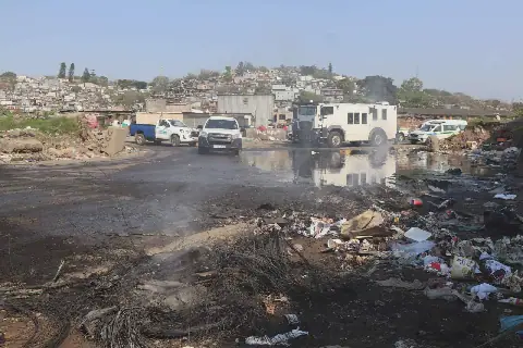 Homeless fire victims protest delayed building materials in South Africa
