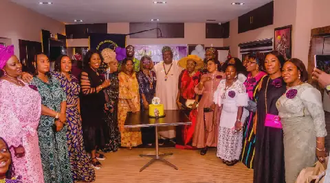 Oluomo Sunday-Akere (middle), and members of Ikeja Viva L'Amour Lions Club during the public presentation of Morenike Nnamdi- Nwosu as the 21st president of the club in Lagos, recently.