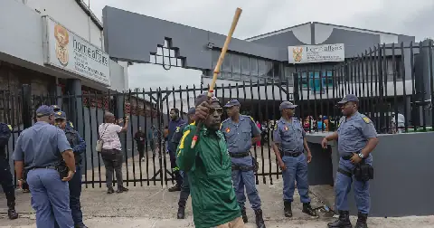 The asylum application process descended into chaos last week when protesters, including members of March and March, Labour Law Enforcement and other groups, gathered outside the department of home affairs offices on Che Guevara Road in Berea, Durban, blocking the entrance and preventing people from entering or leaving the premises. Picture: Sandile Ndlovu
