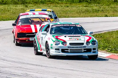 Syd Lippstreu in his Toyota Celica leads Rane Berry in his Nissan Skyline and Pikkie Marais in his Ford Capri through the esses at Aldo Scribante Raceway