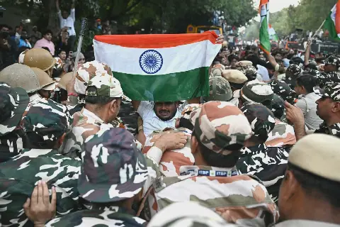 Batman masks to offline maps: India youth shift tactics as police clamp down on election protest
