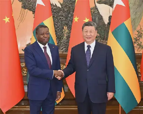 Xi