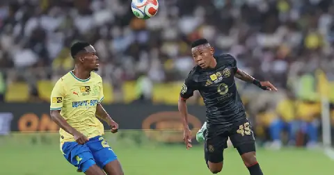 Thabang Matuludi of Mamelodi Sundowns challenges Kabelo Kgotsitsile of Orlando Pirates in 2026 MTN8 final at Moses Mabhida Stadium in Durban. Picture: Muzi Ntombela/BackpagePix