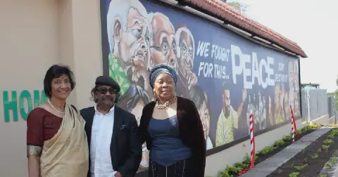 World renowned artist Nanda Soobben, flanked by Judge Navi Pillay and Gcina Mhlophe, at the unveiling of a peace mural that seeks to promote peace after last year KZN unrests.