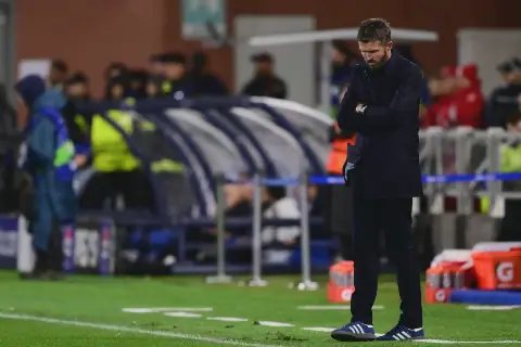 Neville warns managers need sacking 'for their own good' as Carrick fights on