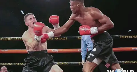 Jason Medi rocks Keagan Mills during their fight Medi won on points.