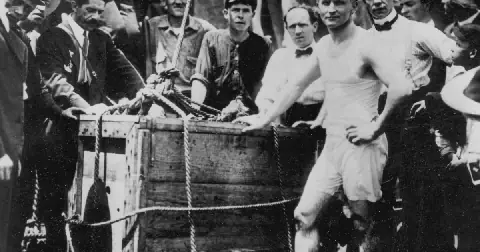 Escape artist Harry Houdini is shown before being lowered in a packing crate into the ice-covered Detroit River in 1907.